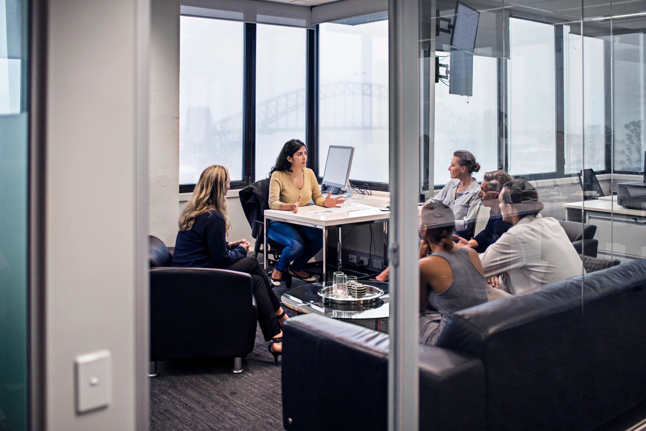 Business meeting with Sydney Harbour Bridge in the background